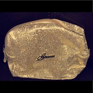 gold glitter Guess makeup bag